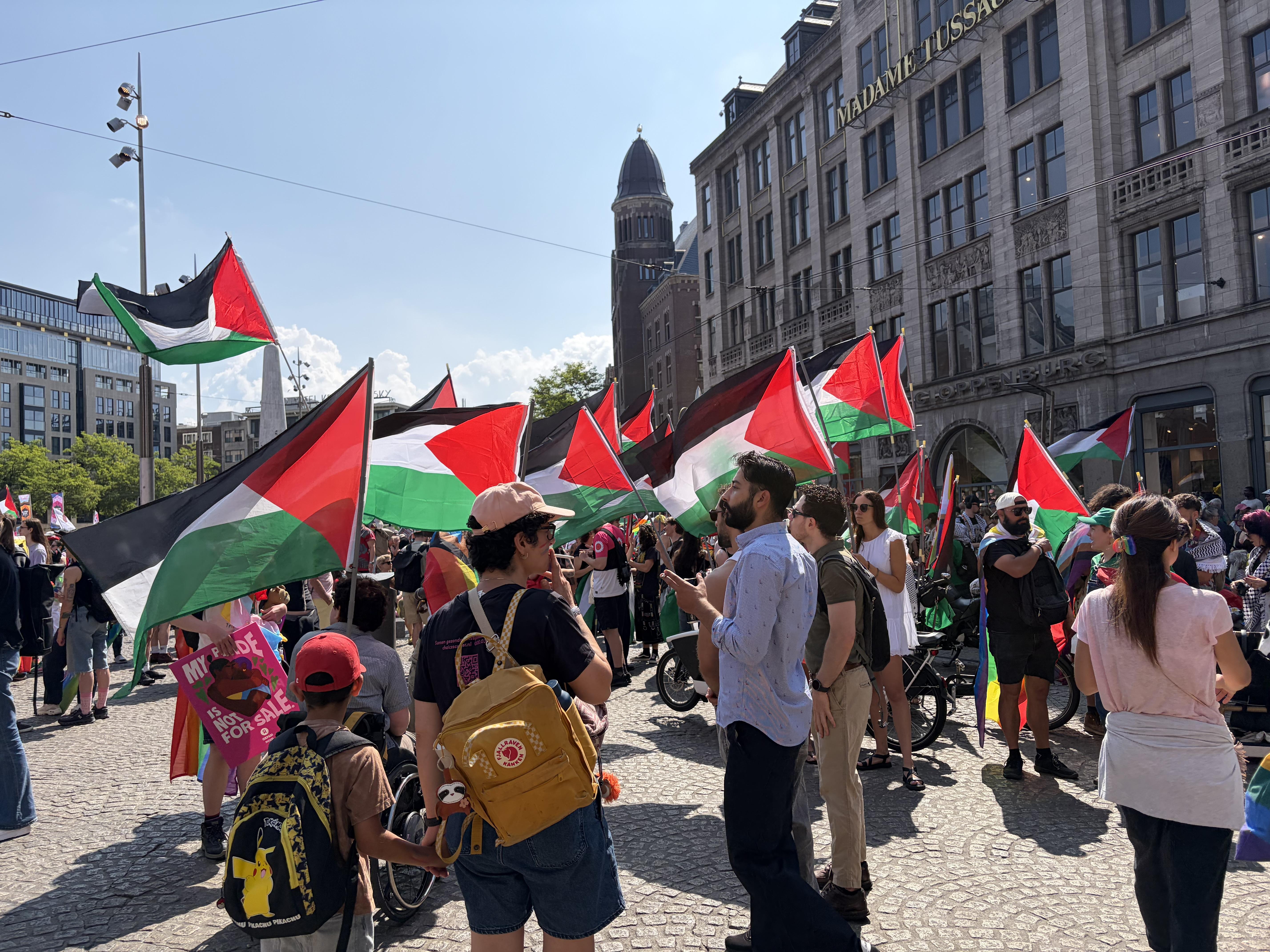 Palestinian flags wave in Dams Square Amsterdam